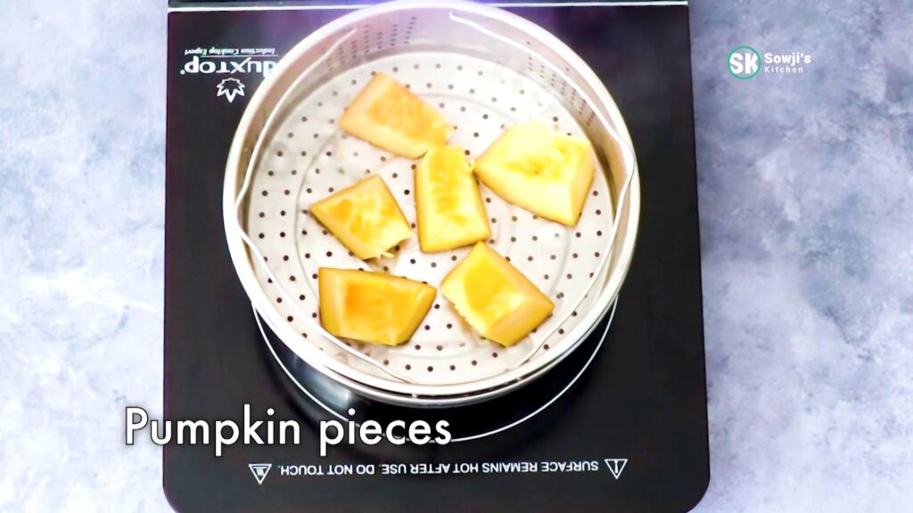 PSL place pumpkin pieces in the steamer basket